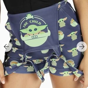 The child short overalls